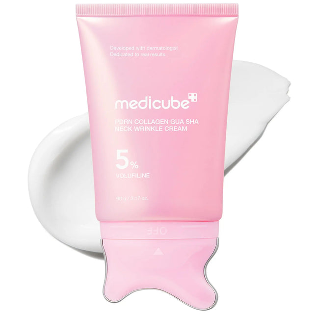 Medicube PDRN Gua Sha Neck Cream pink tube with its built-in gua sha head and a white cream swatch