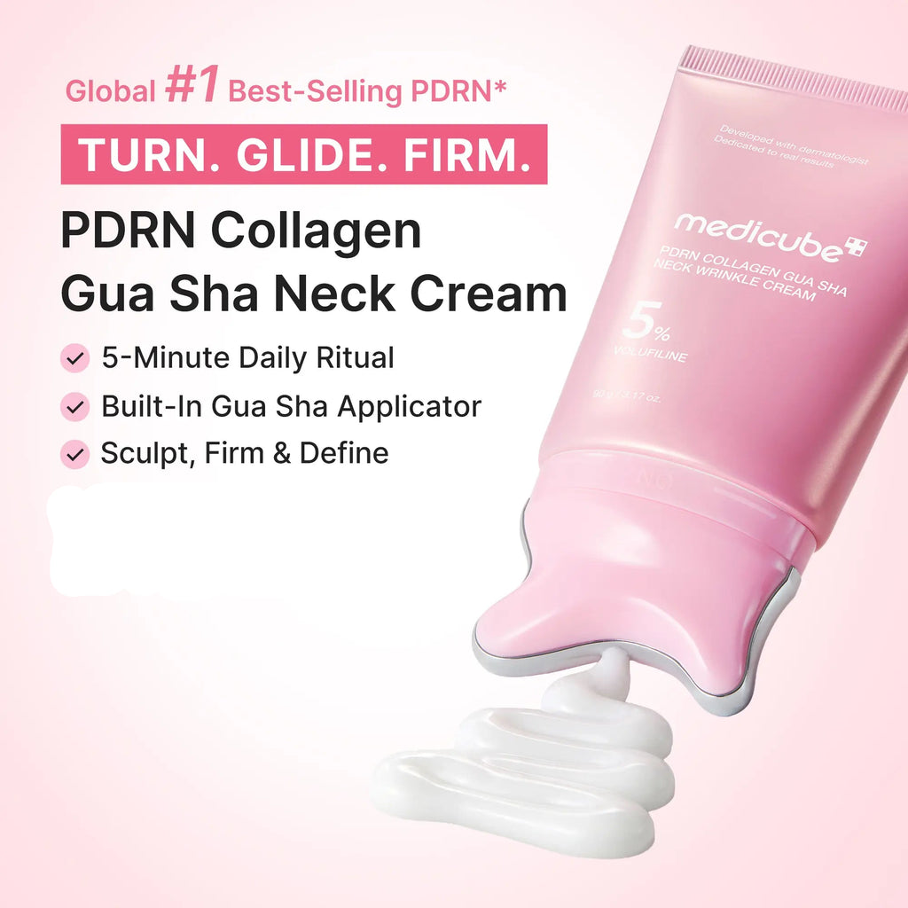 Pink tube dispensing white cream through the built-in gua sha applicator head
