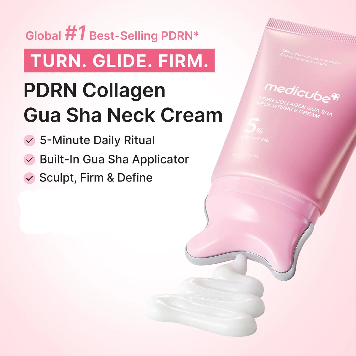 Pink tube dispensing white cream through the built-in gua sha applicator head