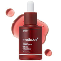 Medicube EGF NAD Firming Serum in a dark red glass dropper bottle with red serum droplets