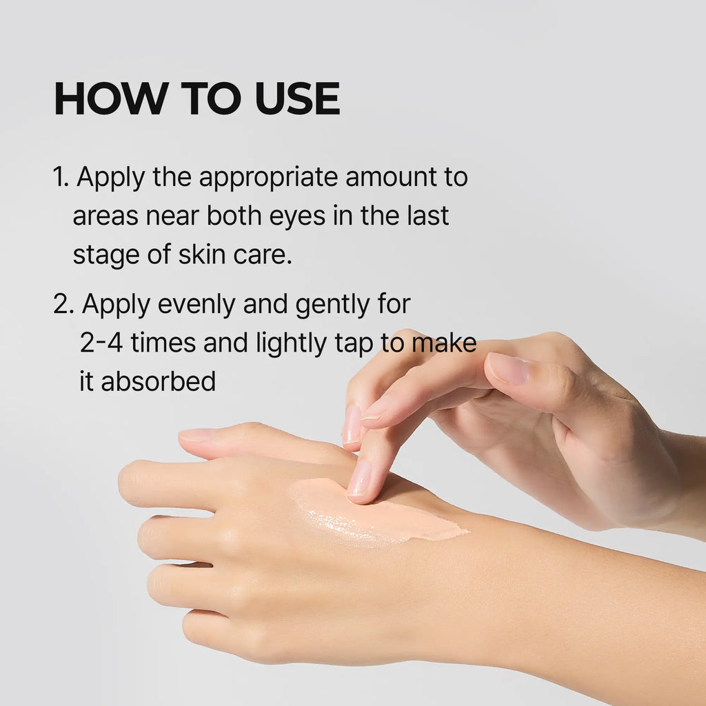 Hands tapping a small amount of the peach cream onto the back of a hand